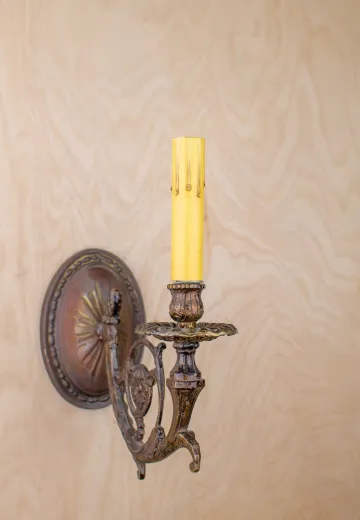 Single Curved Arm Wall Sconce