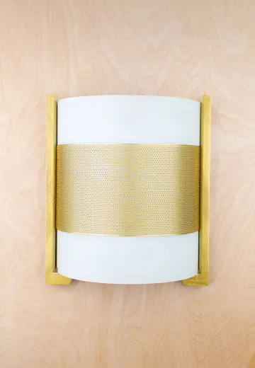 Contemporary Brass Wall Sconce With Curved Frosted Glass Shade