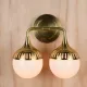 Brass Two Light Glass Globe Shaded Wall Scocne #0